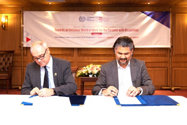 Tuomo Poutiainen, the Country Director of ILO Country Office for Bangladesh and Murteza Khan, the Chief Executive Officer of BBDN signing the MoU.