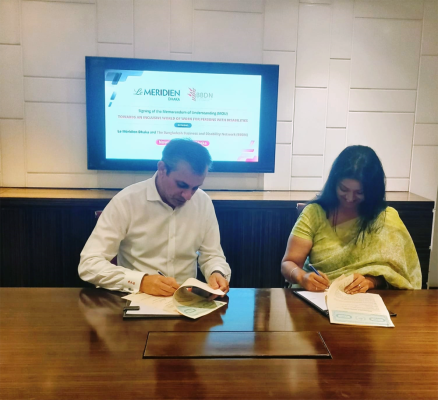 Captured in a moment of commitment: Mr. Constantinos S. Gavriel and Mrs. Aziza Ahmed, pens in hand, signing the MoU paper that solidifies their shared dedication to advancing disability inclusion.