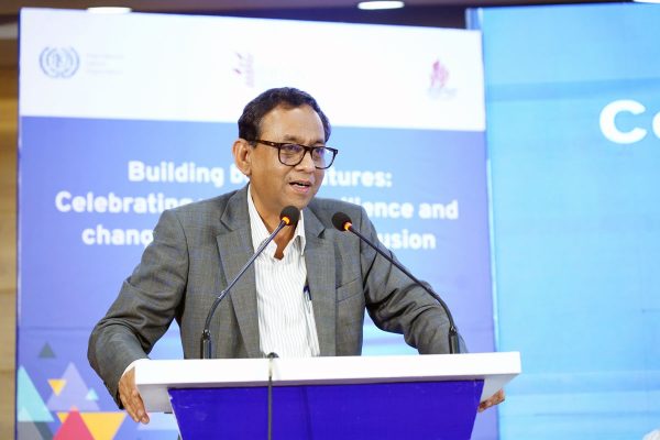 Mr. A H M Shafiquzzaman, Secretary of the Ministry of Labour and Employment, delivering remarks.