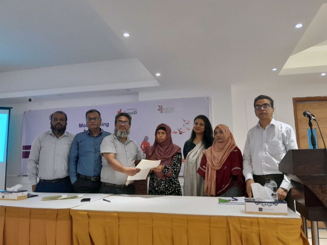 Group photo taken after the MoU signing ceremony between two TVET institutes - Rajshahi Women Technical Training Center and Rajshahi Technical Training Center - and the local organization of persons with disabilities, 'Protibondhi Nari Odhikar Bikash Sangstha'.