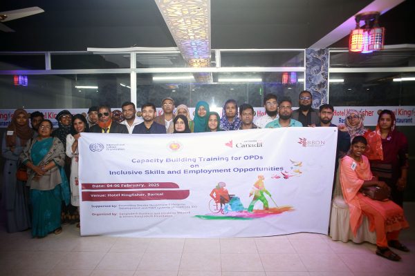 Group photo of facilitators, organizers, and participants.