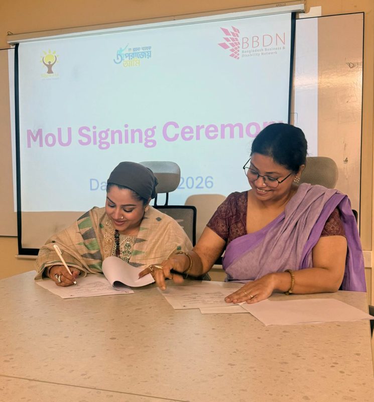 MoU signing taking place.